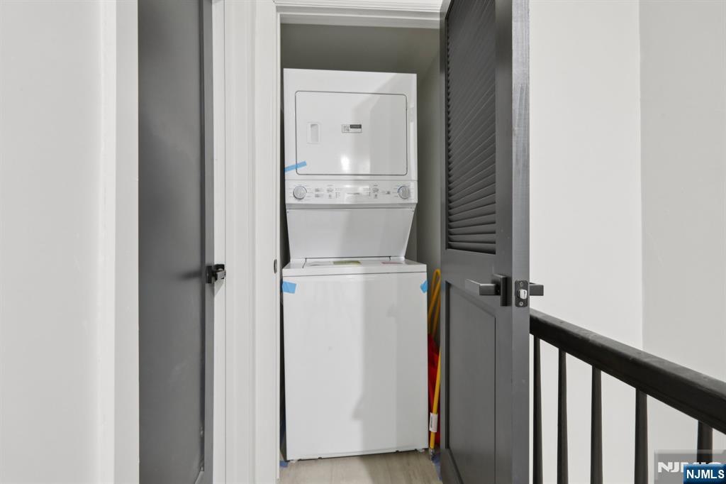 542 East 25th Street, Unit 540 Paterson, NJ 07514 - Photo 11 of 11 a view of storage and utility room with washer and dryer