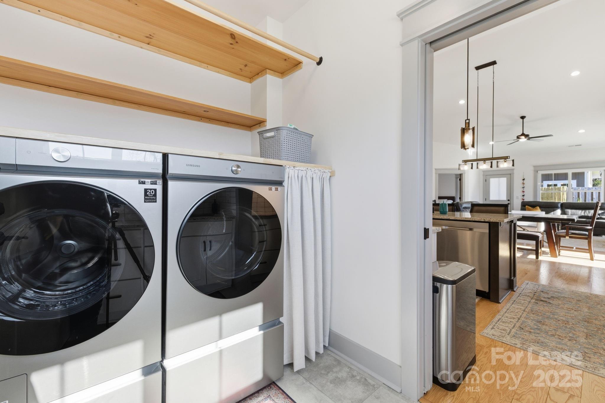 46 Cozy Cottage Way Arden, NC 28704 - Photo 17 of 37 a view of a kitchen with washer and dryer