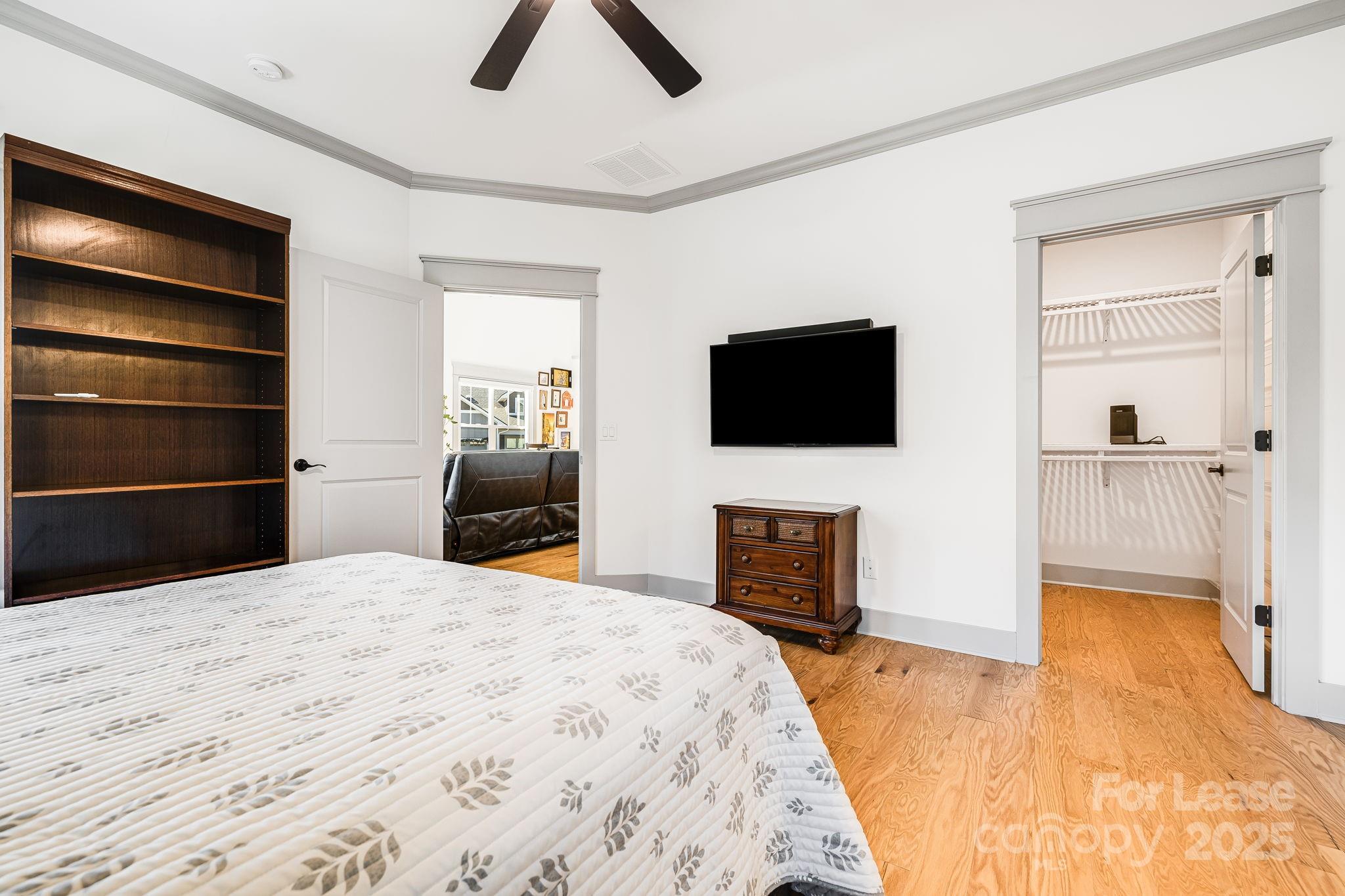 46 Cozy Cottage Way Arden, NC 28704 - Photo 22 of 37 a bedroom with a bed and a flat screen tv