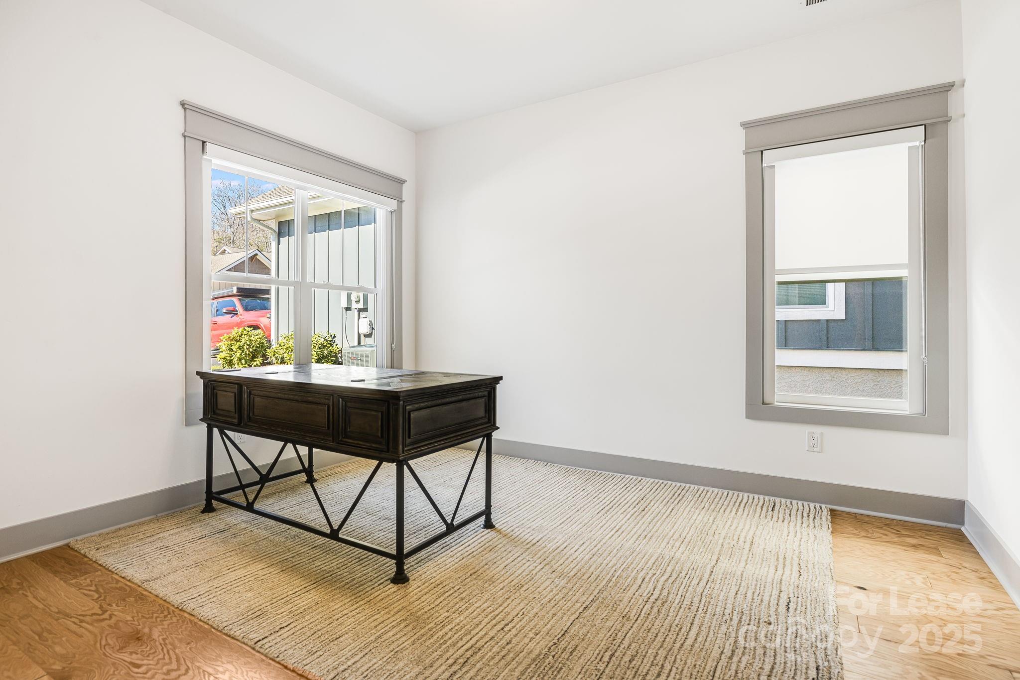 46 Cozy Cottage Way Arden, NC 28704 - Photo 26 of 37 a workspace room with furniture and wooden floor