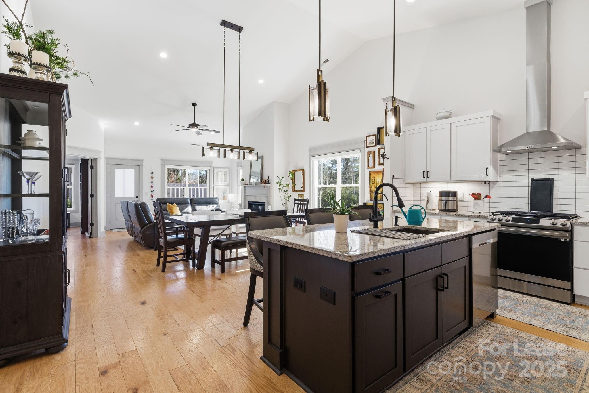 46 Cozy Cottage Way Arden, NC 28704 - Photo 10 of 37 a open kitchen with stainless steel appliances granite countertop a stove and cabinets