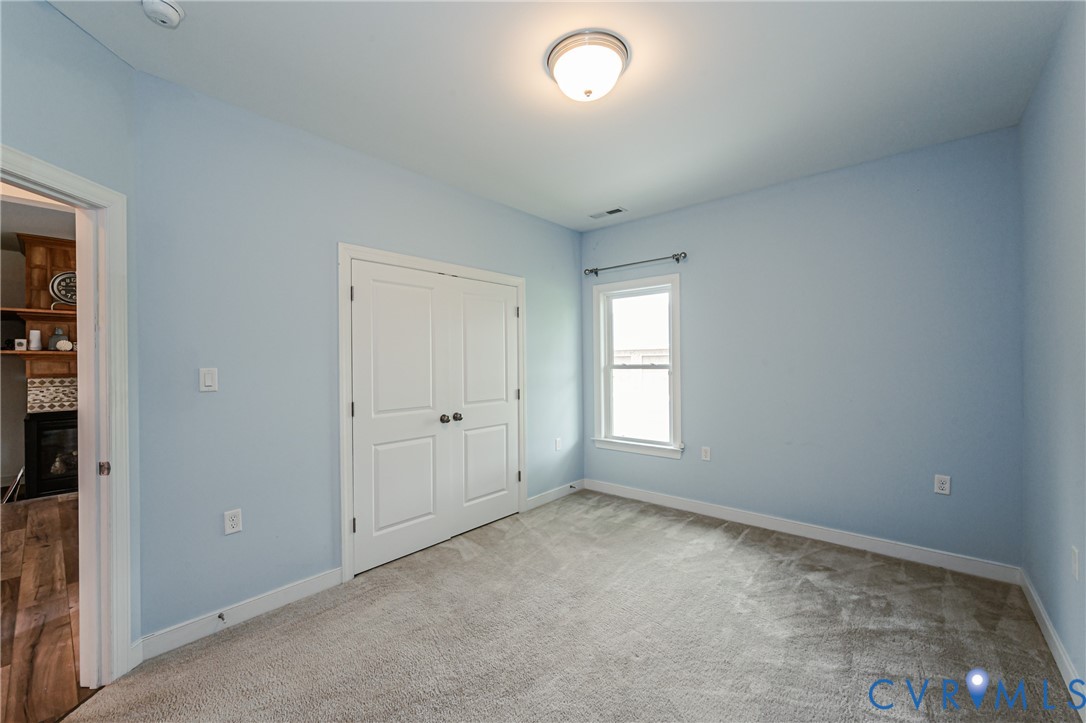2018 Valentine Road Henrico, VA 23228 - Photo 32 of 65 an empty room with a empty space and windows