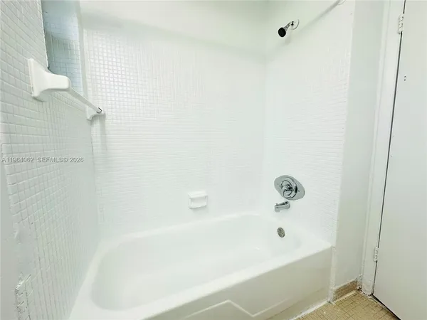 a bathroom with a bathtub