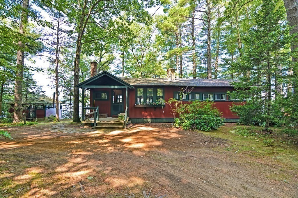 192 Red Gable Road East Brookfield, MA 01515 - Photo 1 of 42 a front view of a house with a garden