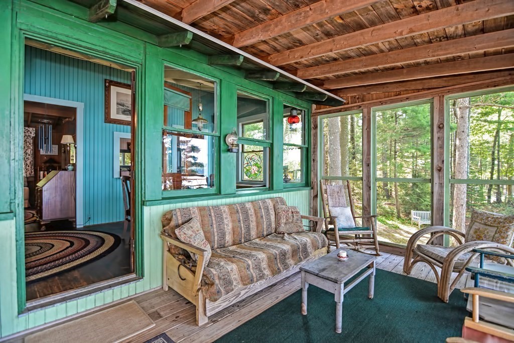 192 Red Gable Road East Brookfield, MA 01515 - Photo 17 of 42 a living room with furniture and a large window