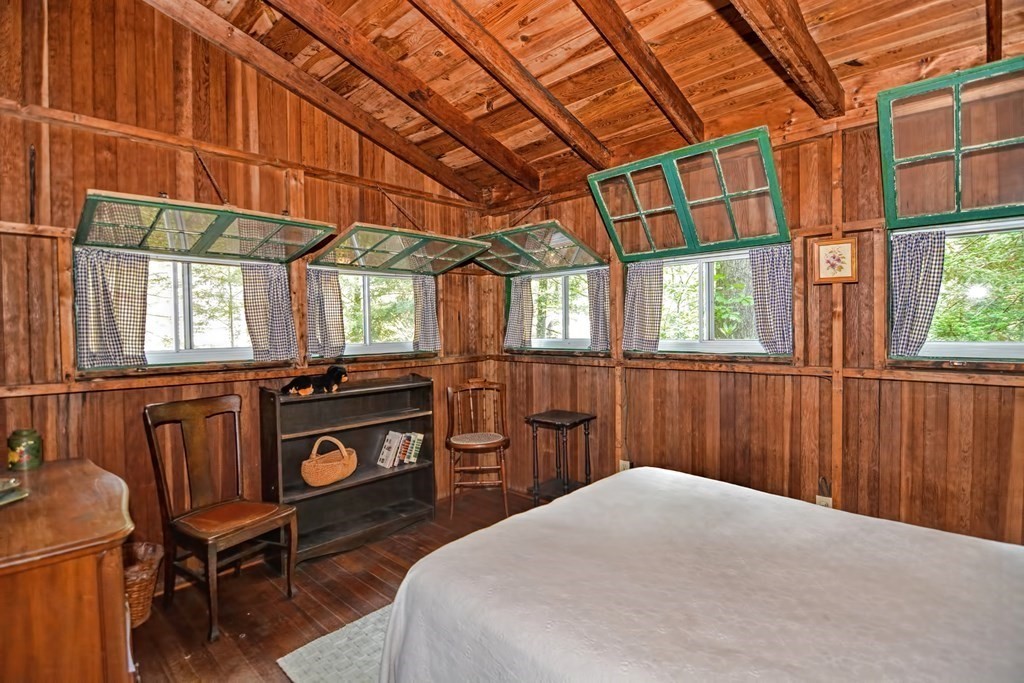 192 Red Gable Road East Brookfield, MA 01515 - Photo 31 of 42 a bed room with a bed and a window