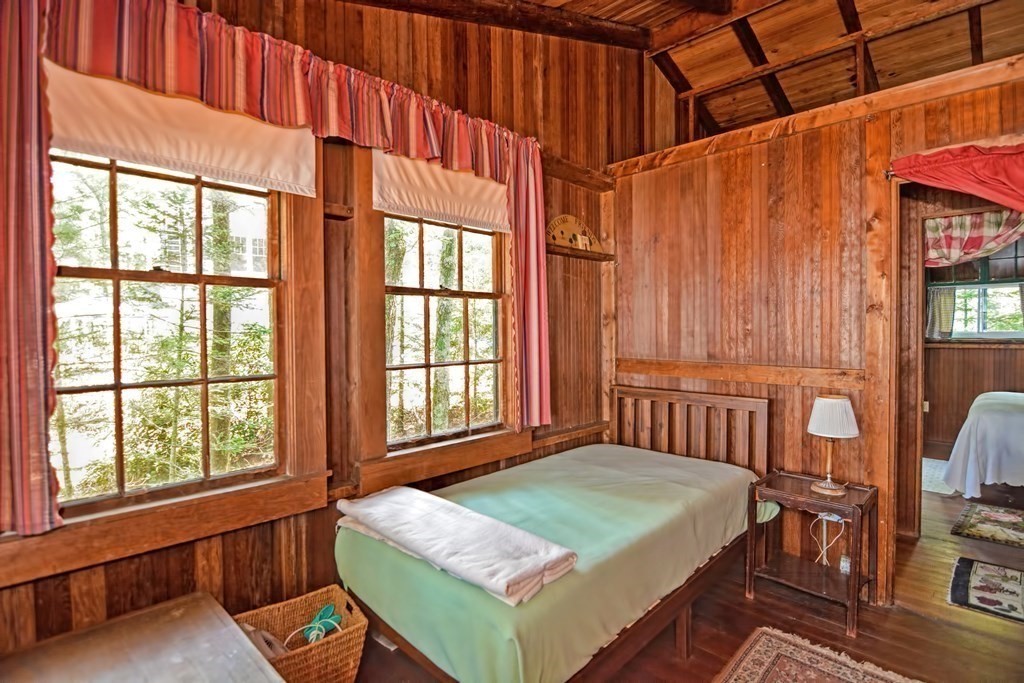 192 Red Gable Road East Brookfield, MA 01515 - Photo 32 of 42 a bedroom with a bed and a window