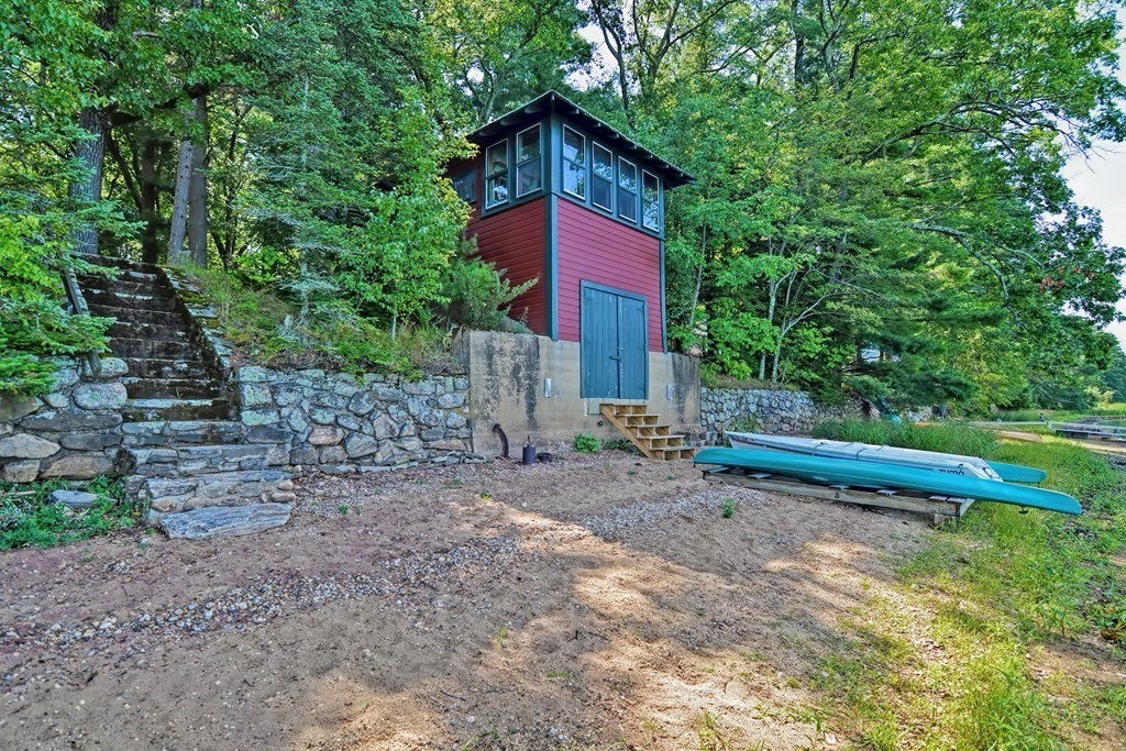 192 Red Gable Road East Brookfield, MA 01515 - Photo 34 of 42 a view of a house with a yard and sitting area