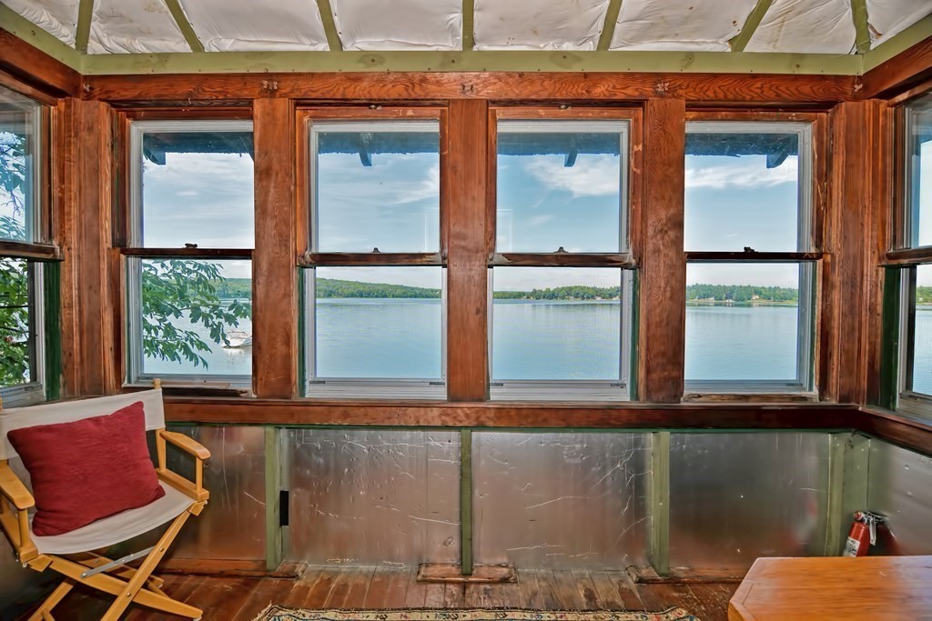 192 Red Gable Road East Brookfield, MA 01515 - Photo 36 of 42 a view of a balcony with chairs
