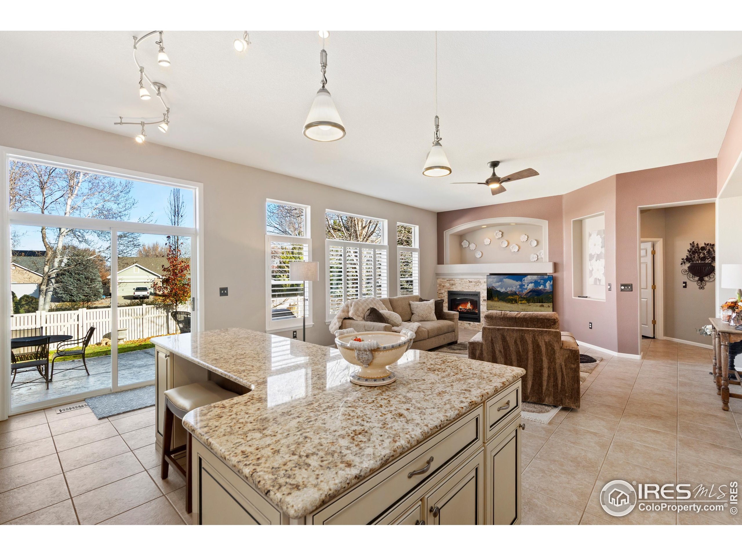 6685 Sage Avenue Firestone, CO 80504 - Photo 10 of 22 a kitchen with a counter top space a sink appliances and cabinets