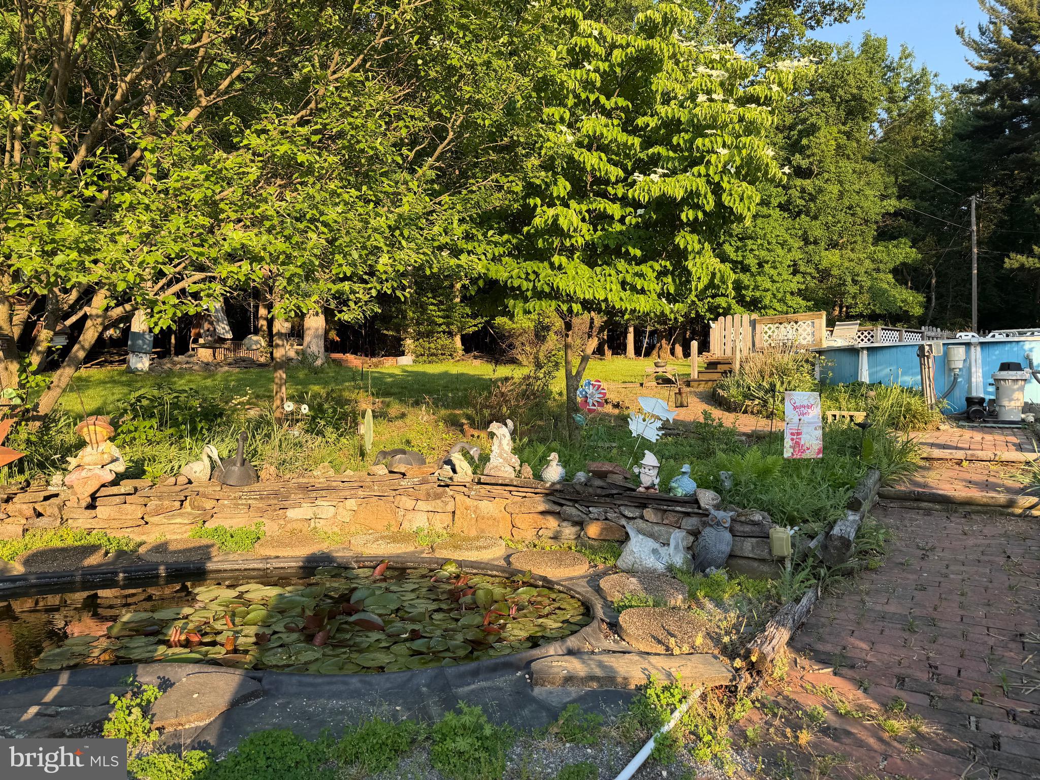 4350 Old Orchard Road York, PA 17402 - Photo 7 of 7 a view of a yard with plants and tree