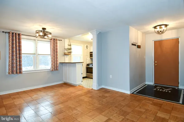 a kitchen with stainless steel appliances granite countertop a stove and a refrigerator
