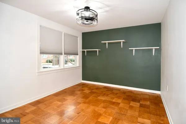 a view of a livingroom with wooden floor
