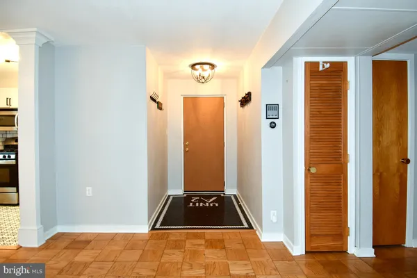 a view of bedroom with a front door