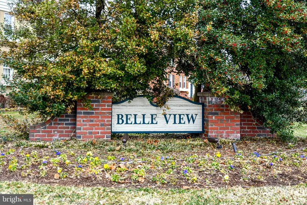 a front view of a building with garden