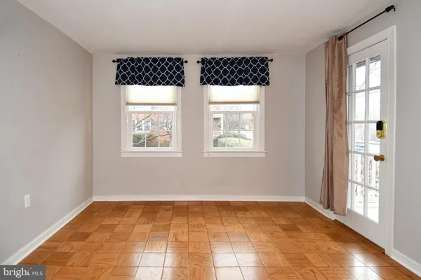 a view of an empty room and window