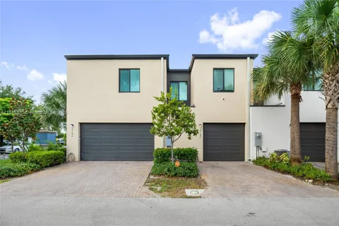 a front view of house with yard