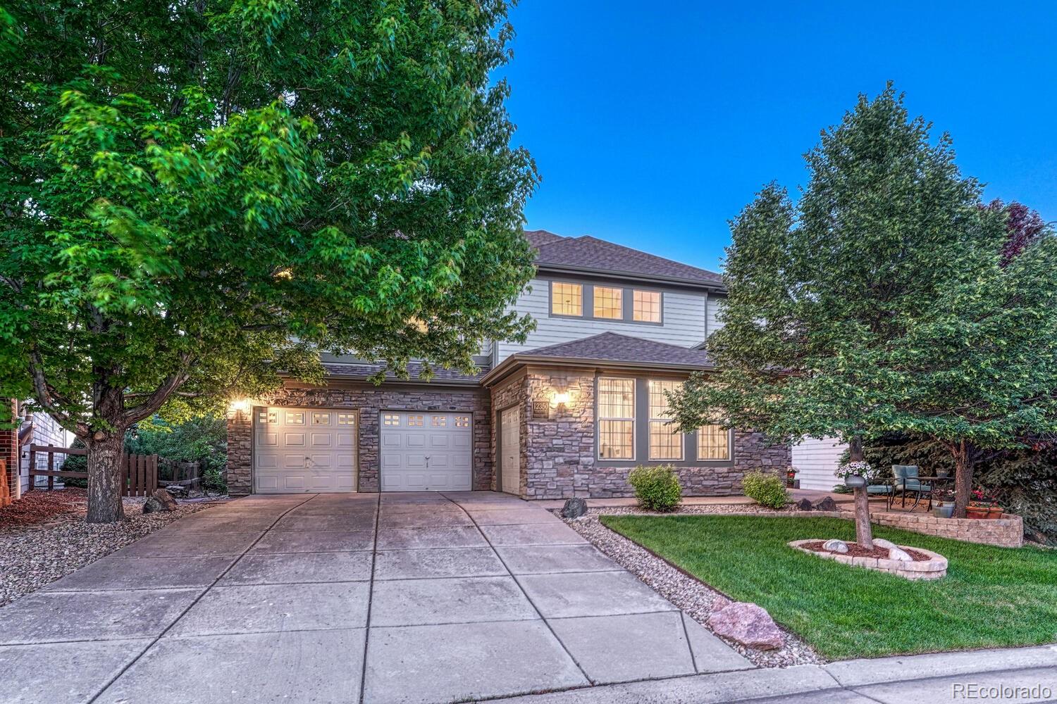 a view of a building with a yard