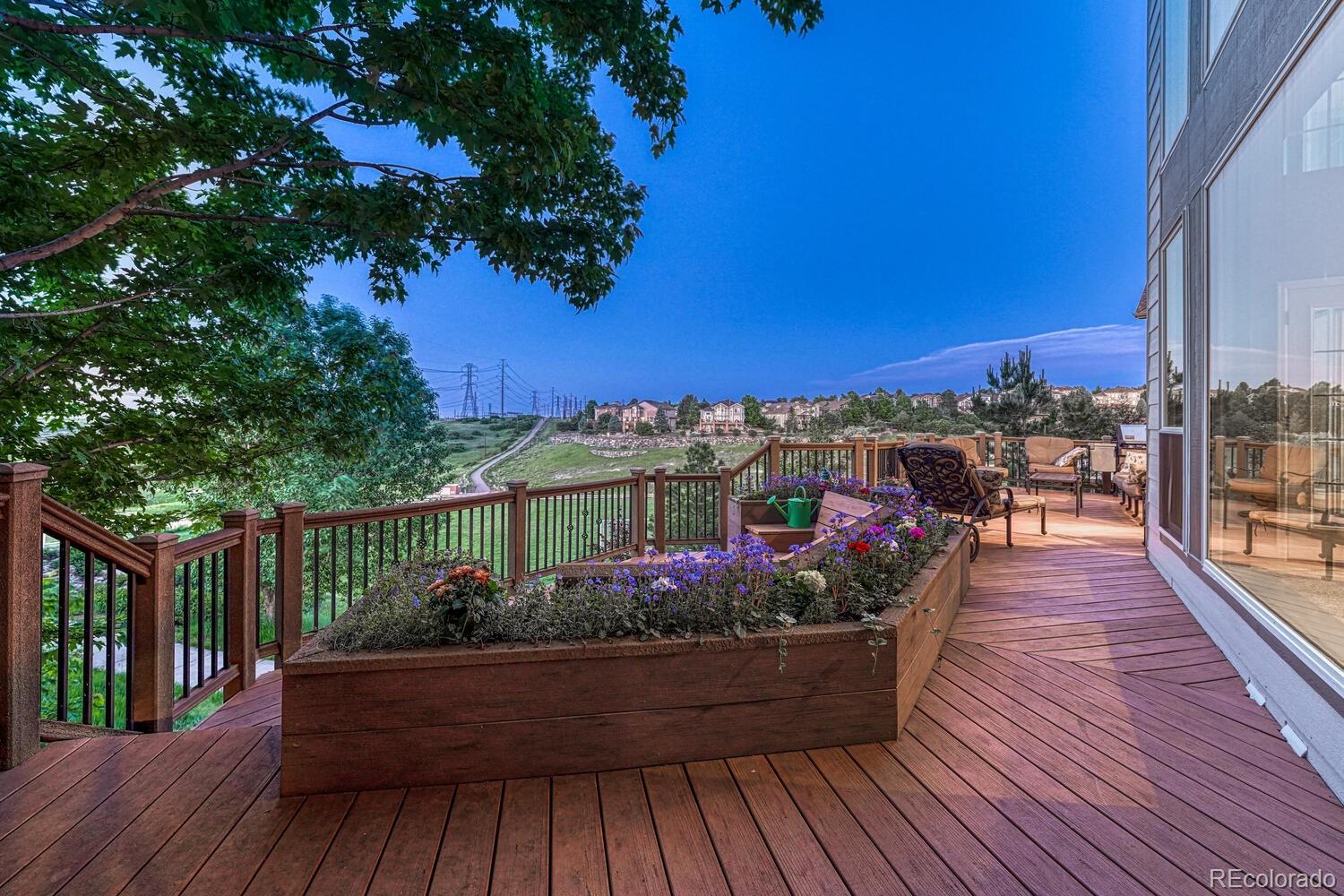 12350 Turquoise Terrace Street Castle Pines, CO 80108 - Photo 37 of 50 a view of a balcony with wooden floor