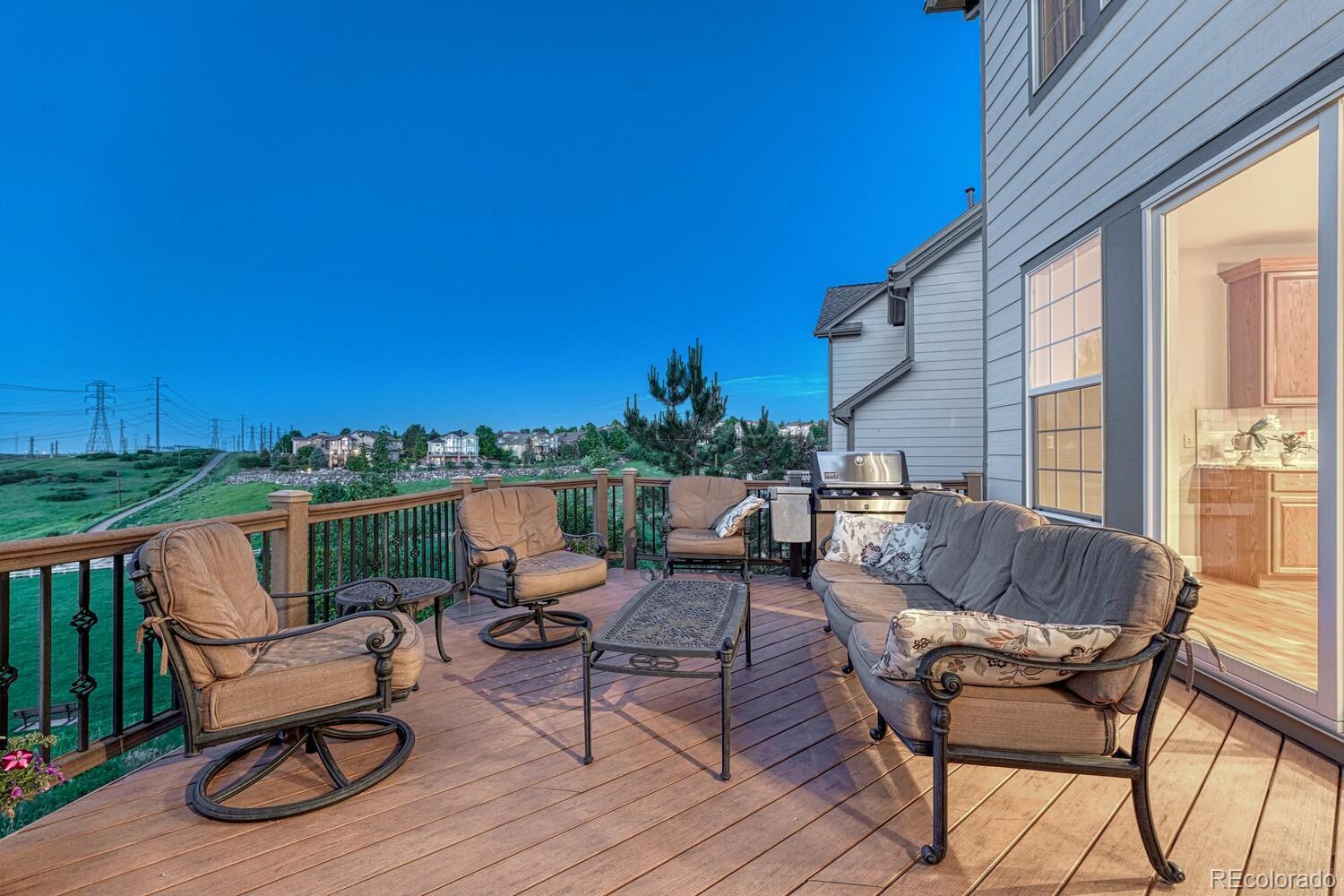 12350 Turquoise Terrace Street Castle Pines, CO 80108 - Photo 40 of 50 a building outdoor space with patio furniture