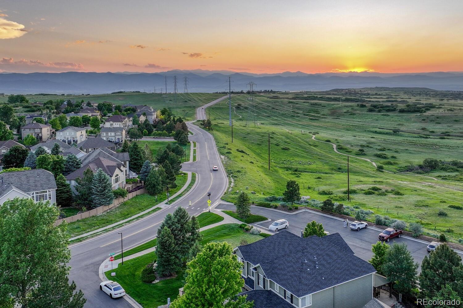 12350 Turquoise Terrace Street Castle Pines, CO 80108 - Photo 43 of 50 a view of a house with a yard