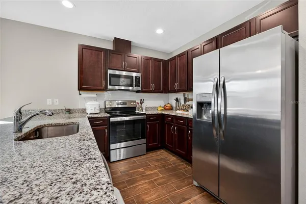 a view of a workspace with furniture