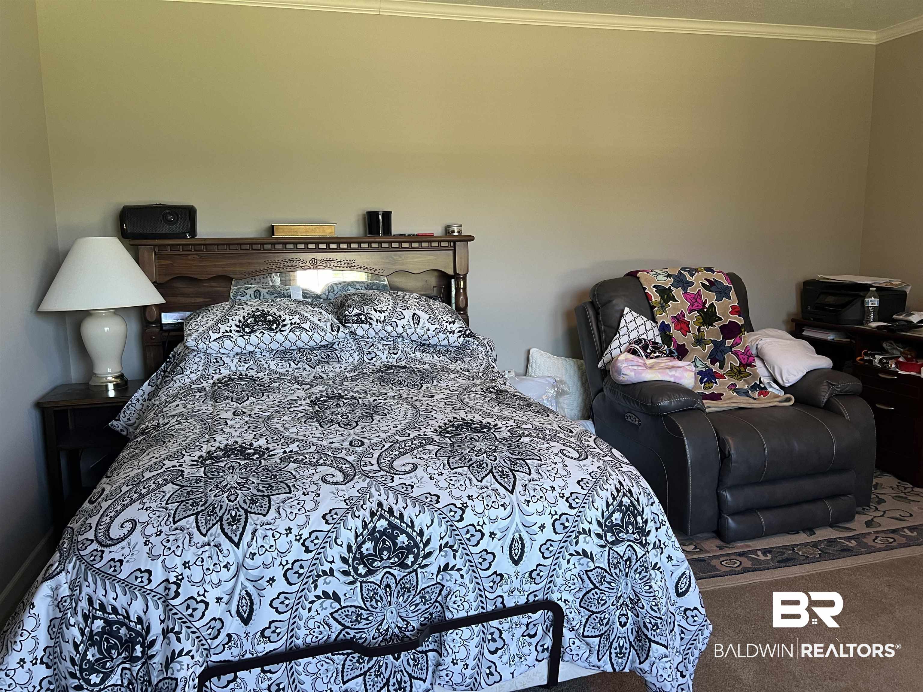 16824 Underwood Road Foley, AL 36535 - Photo 23 of 25 Carpeted bedroom featuring crown molding