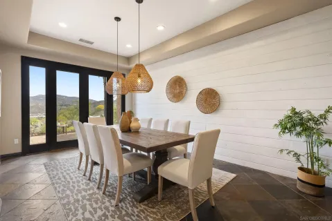 a kitchen with stainless steel appliances a refrigerator sink and stove