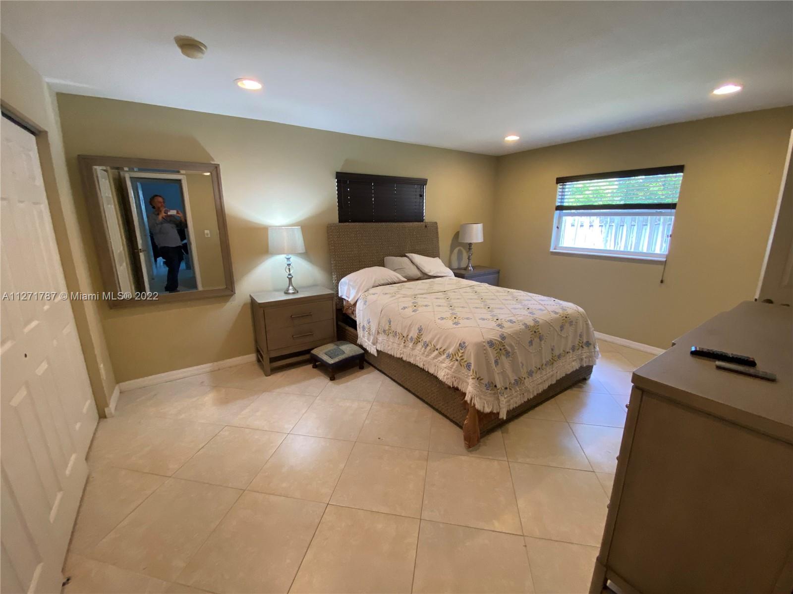 1672 Thumb Point Drive Fort Pierce, FL 34949 - Photo 17 of 29 a bedroom with a bed and a couch