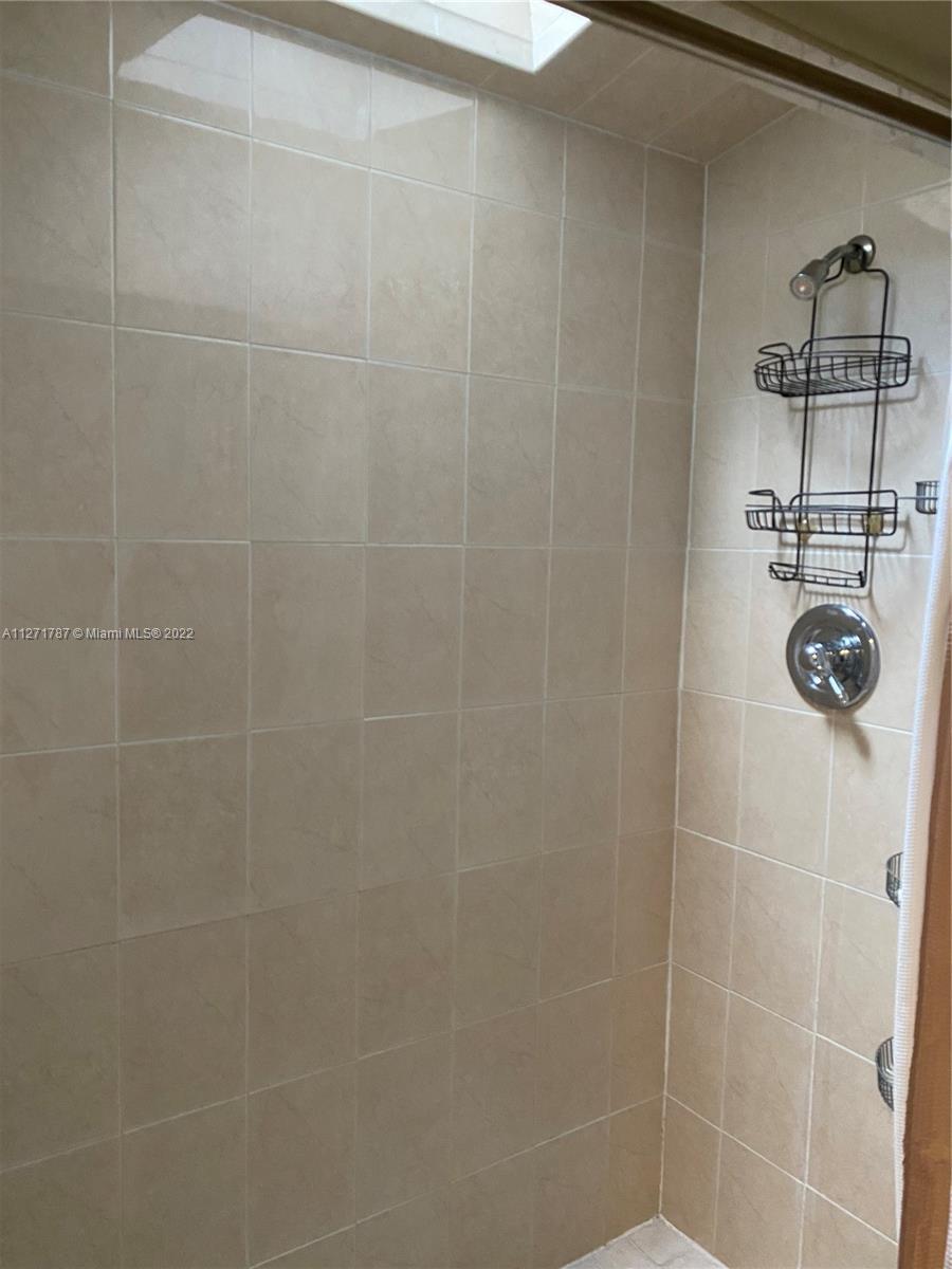 1672 Thumb Point Drive Fort Pierce, FL 34949 - Photo 20 of 29 a bathroom with a shower