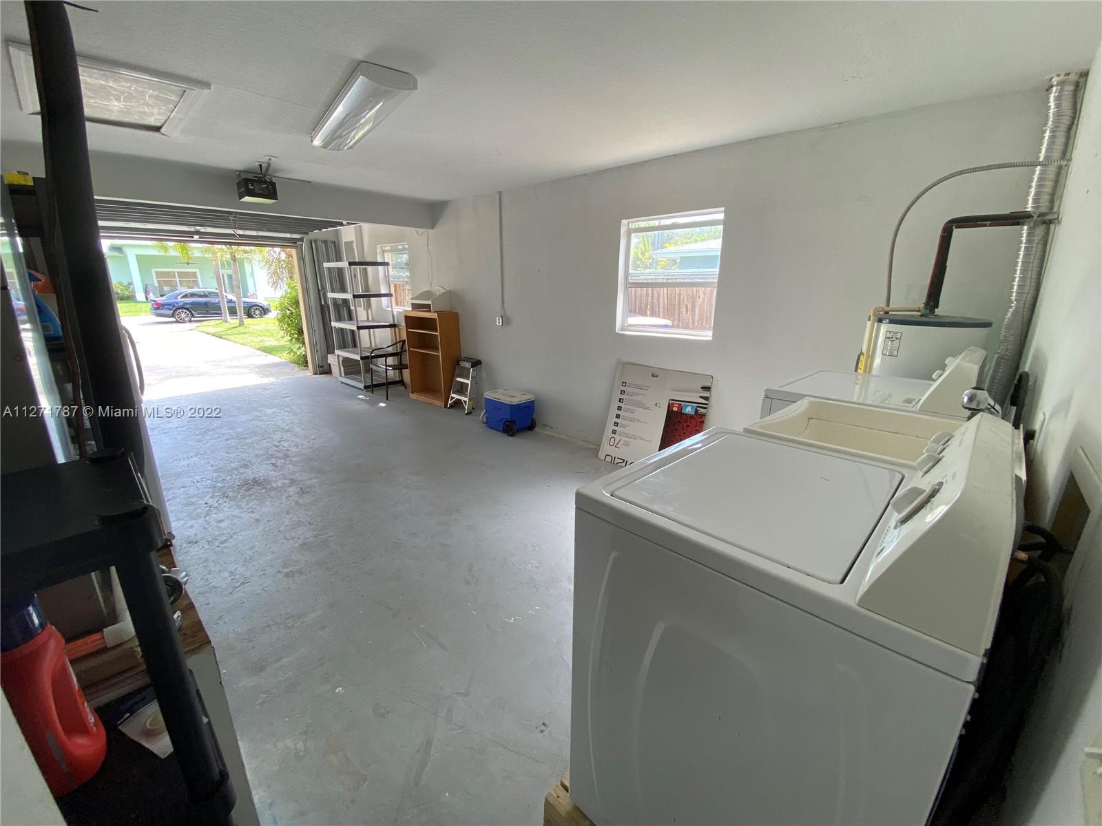 1672 Thumb Point Drive Fort Pierce, FL 34949 - Photo 22 of 29 a room with storage and utility