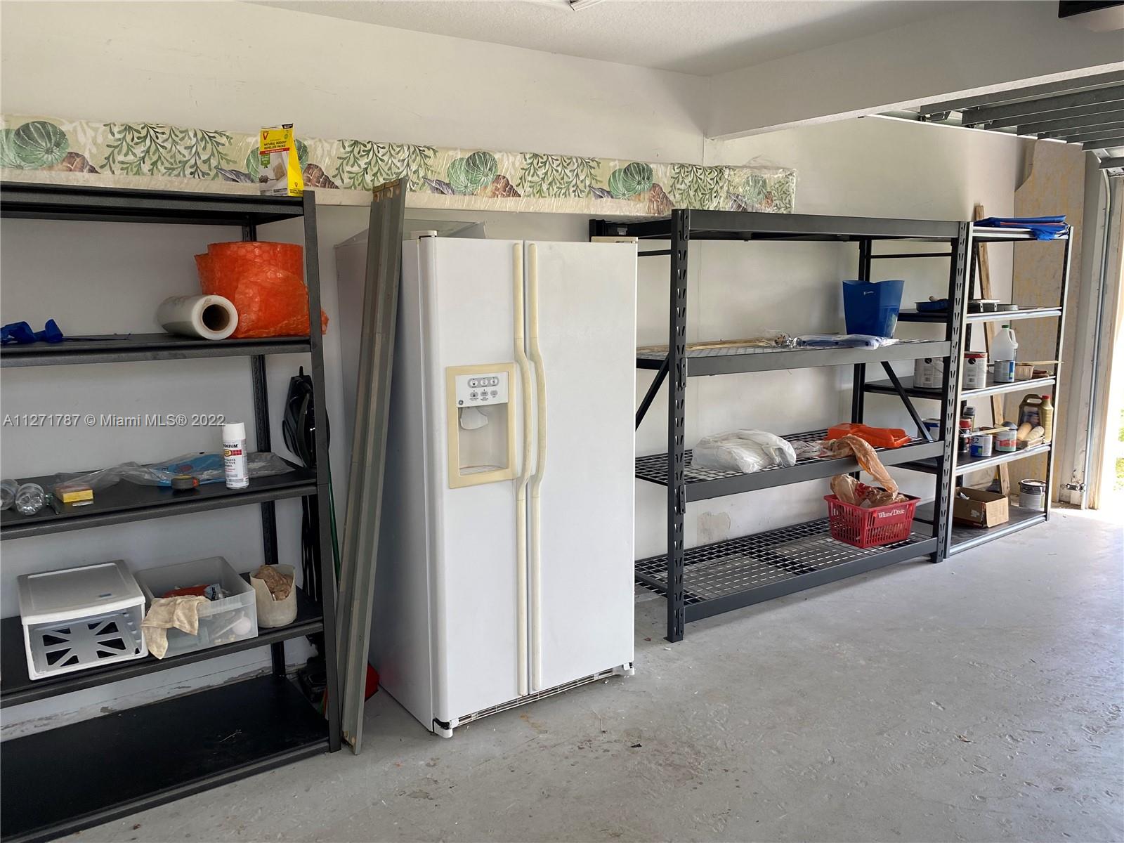 1672 Thumb Point Drive Fort Pierce, FL 34949 - Photo 23 of 29 a storage room