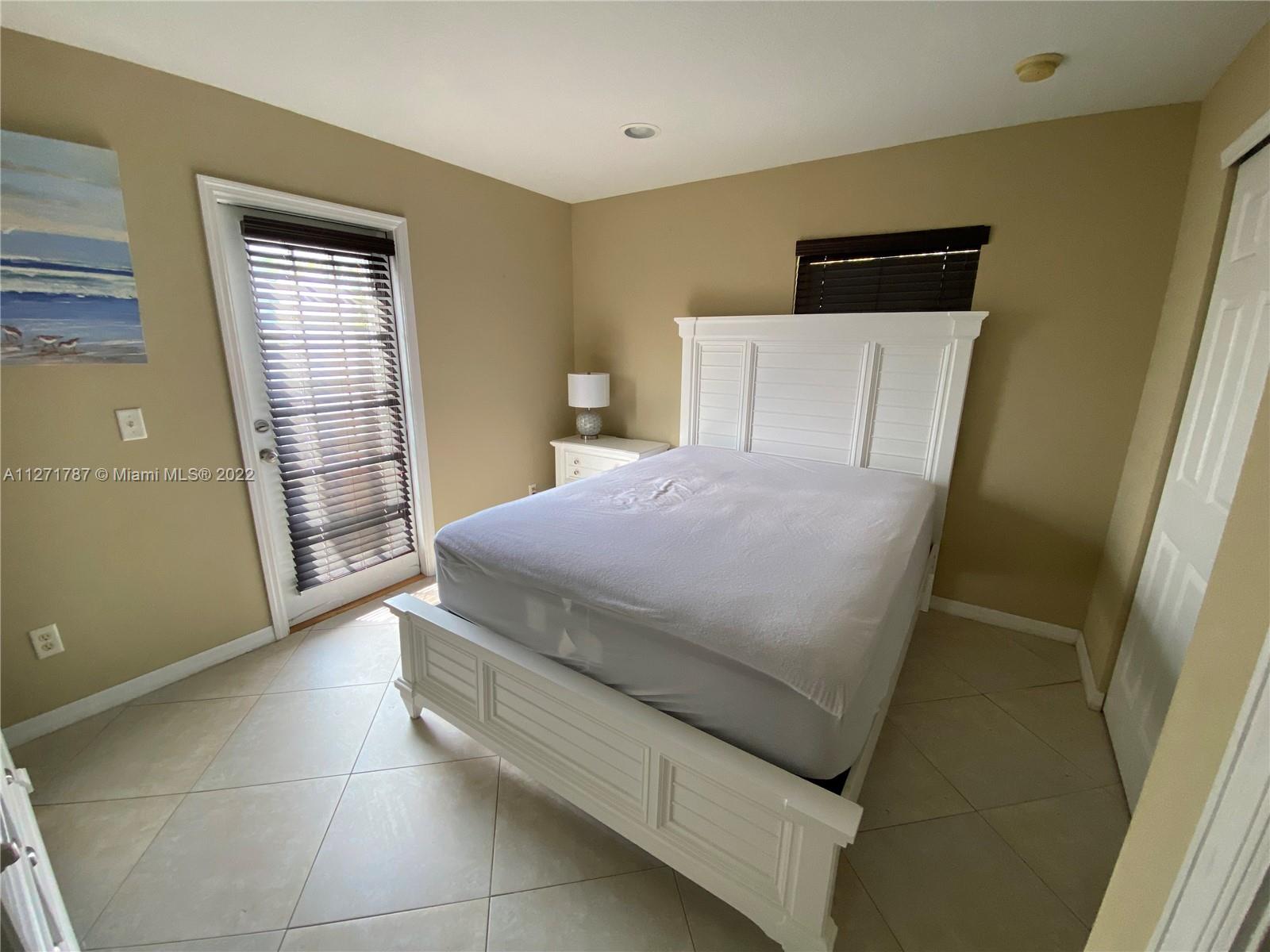 1672 Thumb Point Drive Fort Pierce, FL 34949 - Photo 25 of 29 a room with a bed and a window in it