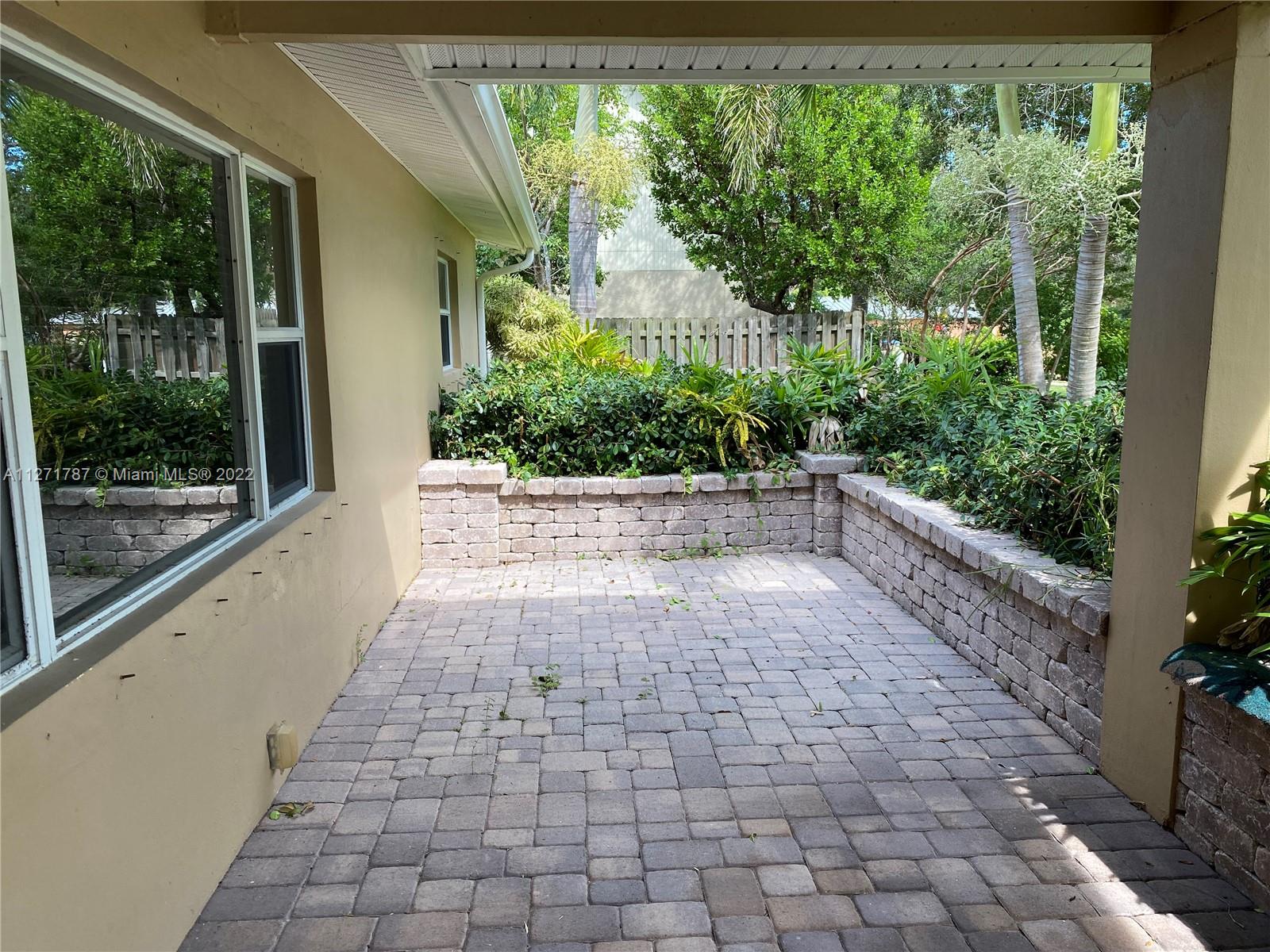 1672 Thumb Point Drive Fort Pierce, FL 34949 - Photo 28 of 29 a view of a garden with pathway