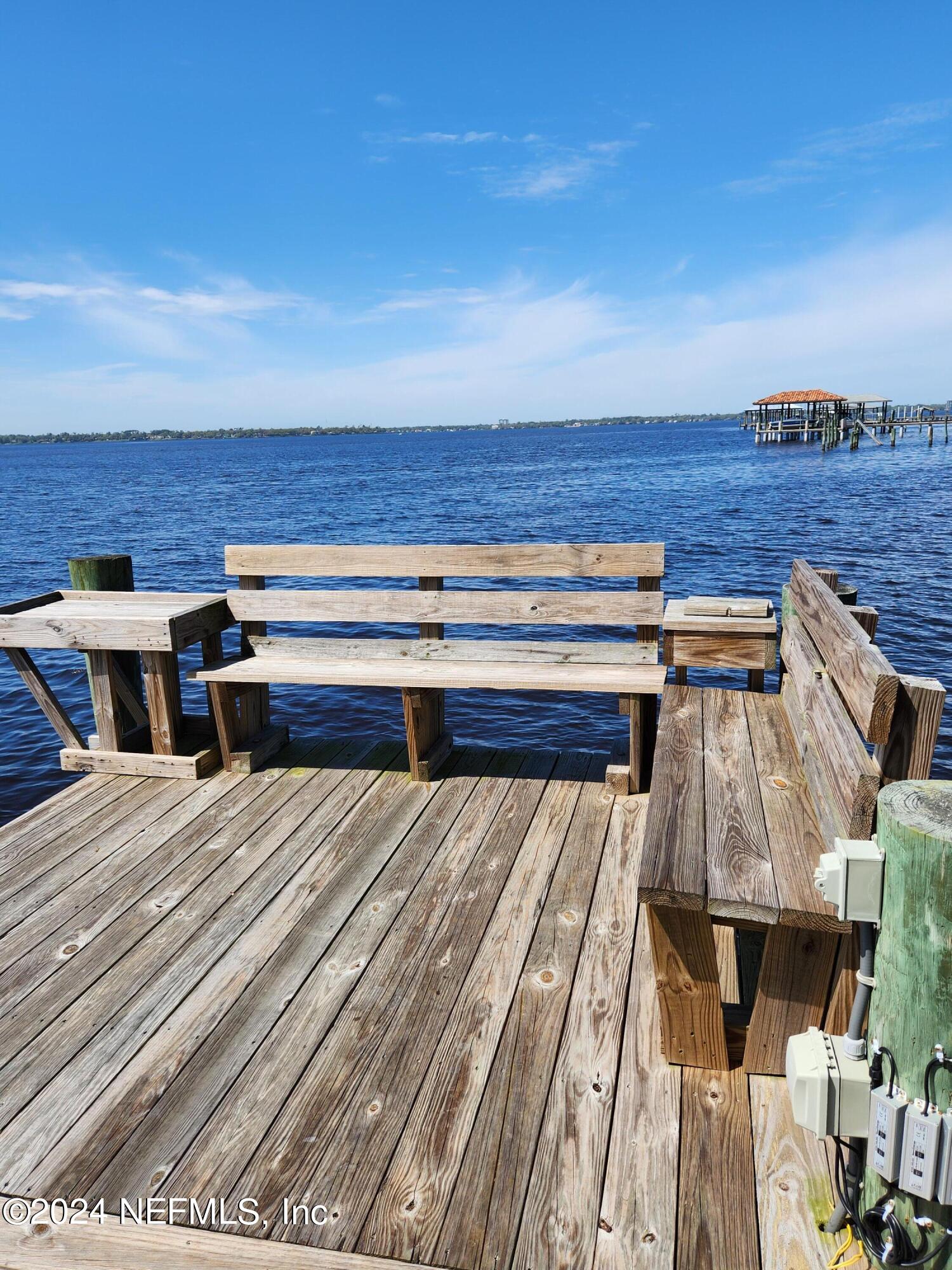 4294 Point La Vista Road West Jacksonville, FL 32207 - Photo 15 of 15 a view of roof deck with wooden floor and city view