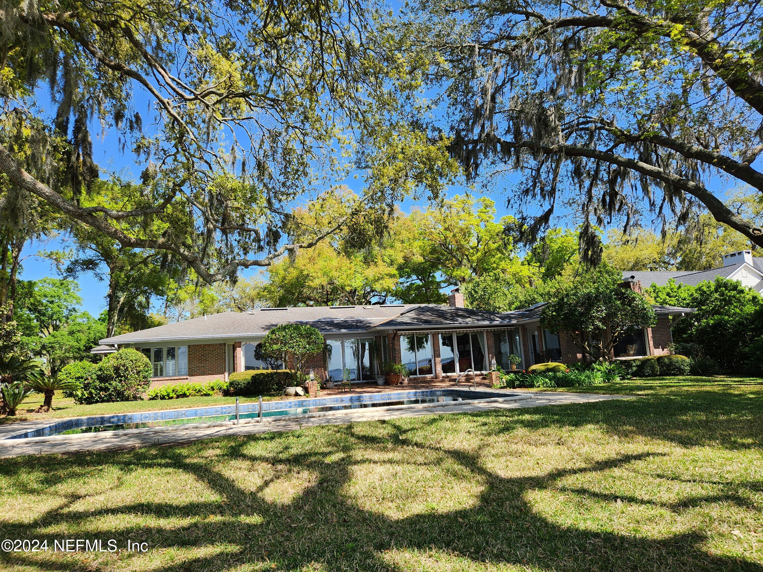 4294 Point La Vista Road West Jacksonville, FL 32207 - Photo 8 of 15 a front view of house with yard space and swimming pool
