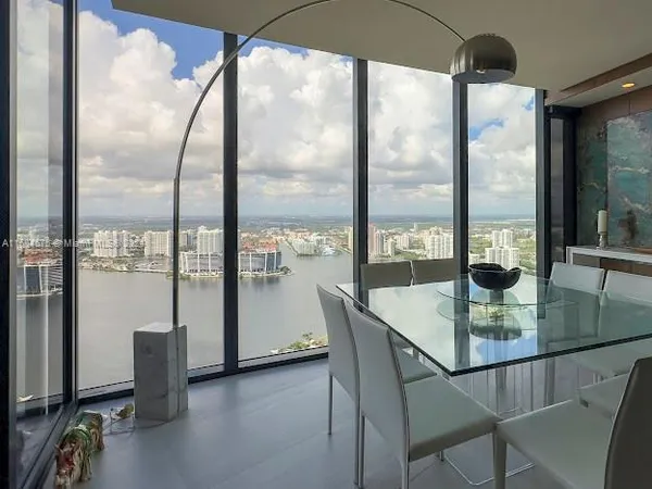 a view of a balcony with chairs