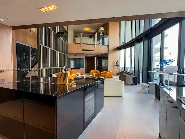 a view of a balcony with chairs