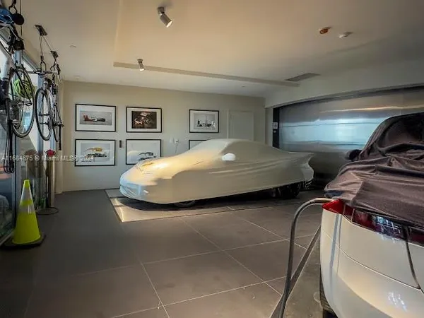 a spacious bedroom with a bed and a walk in closet