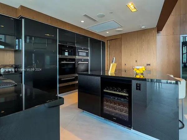 a outdoor living space with furniture and fireplace