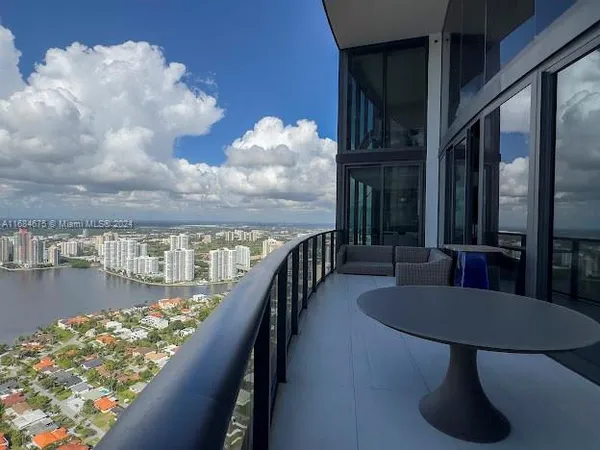 a close view of a toilet sink and mirror