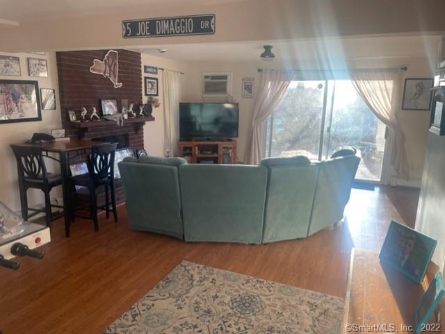 11 Shawnee Road Trumbull, CT 06611 - Photo 4 of 14 a living room with furniture and a large window
