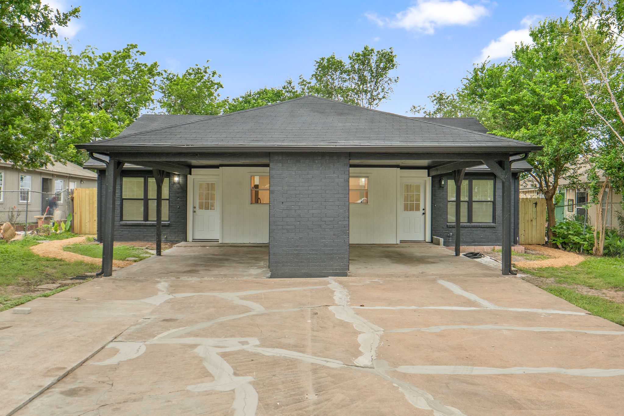 8203 Colony Loop Drive Austin, TX 78724 - Photo 1 of 38 A well-maintained duplex with a covered entry for each unit and carport with driveway