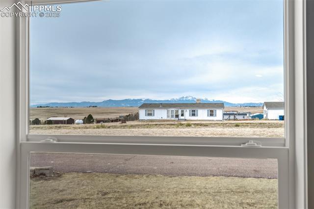 5455 Prospero Road Peyton, CO 80831 - Photo 19 of 47 Mountain View from the Master Bedroom