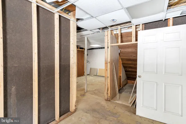 a view of a walk in closet and bathroom