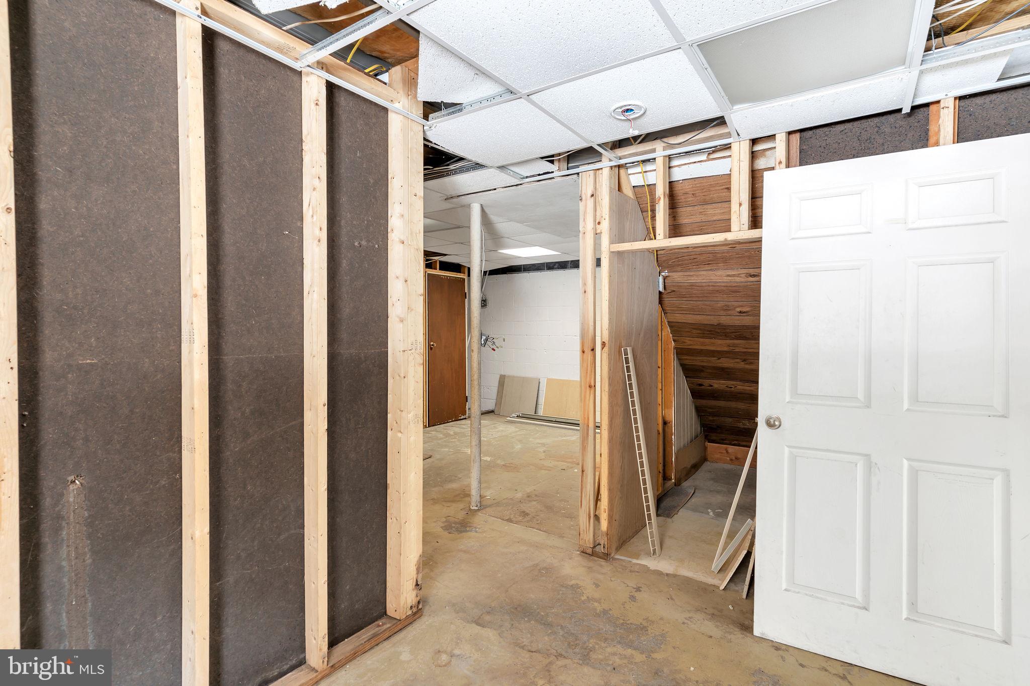1150 Calvert Beach Road St. Leonard, MD 20685 - Photo 26 of 42 a view of a walk in closet and bathroom