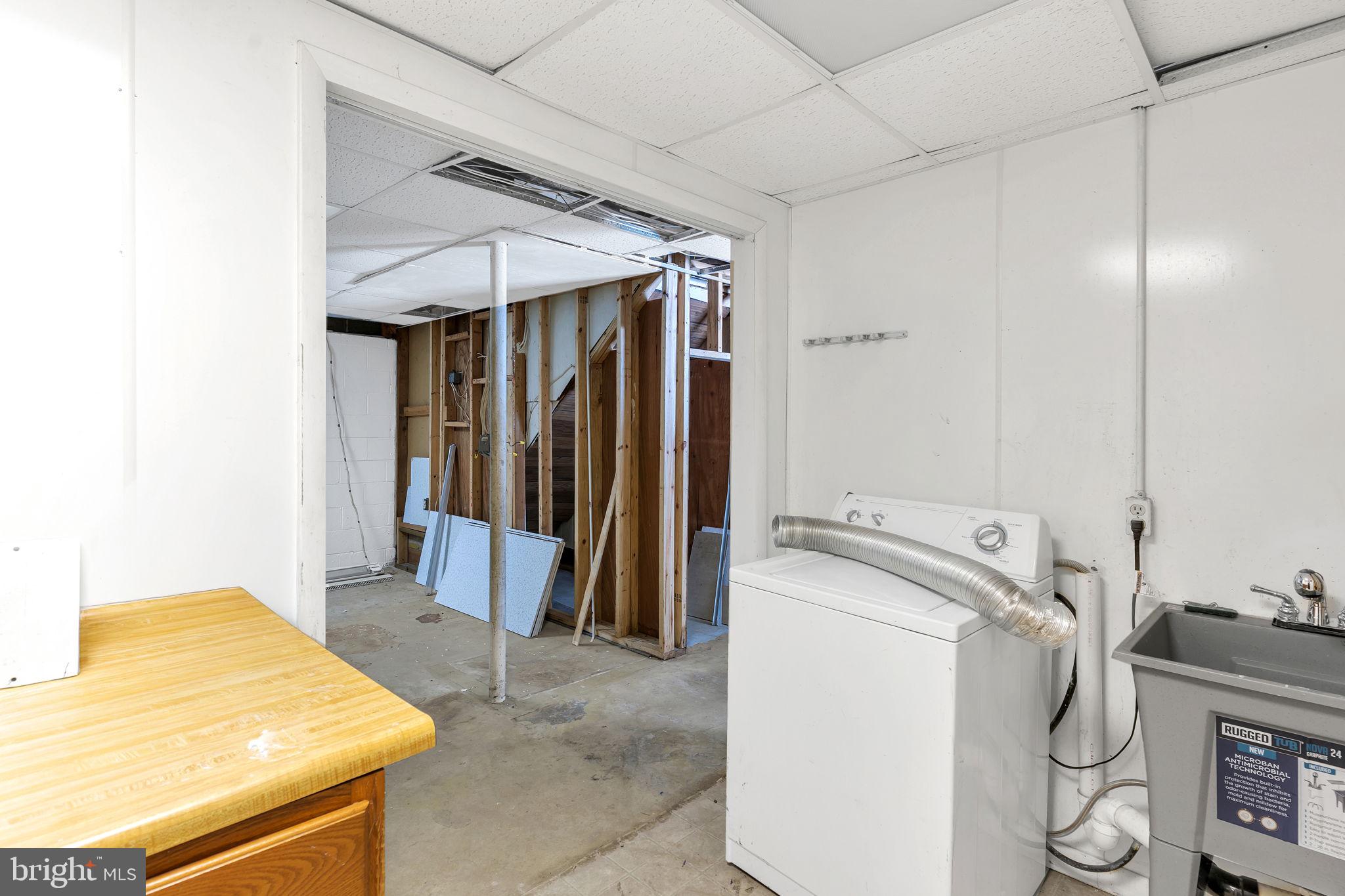 1150 Calvert Beach Road St. Leonard, MD 20685 - Photo 29 of 42 a utility room with dryer and washer