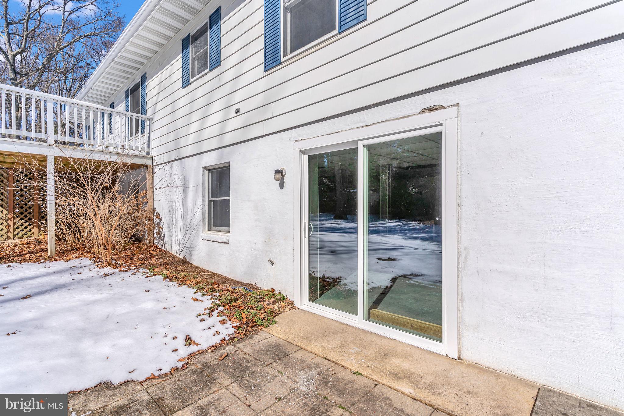 1150 Calvert Beach Road St. Leonard, MD 20685 - Photo 33 of 42 a view of a entrance door of the house