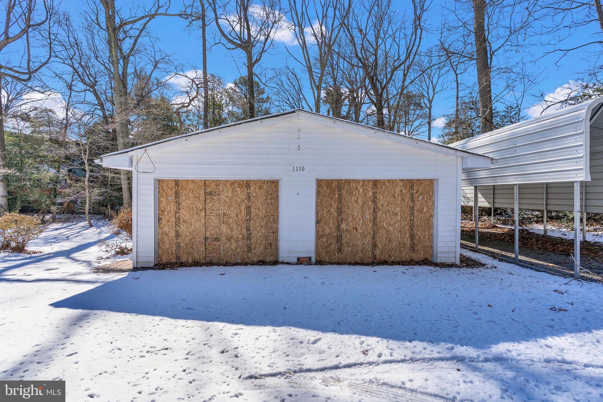 1150 Calvert Beach Road St. Leonard, MD 20685 - Photo 36 of 42 a front view of house with yard