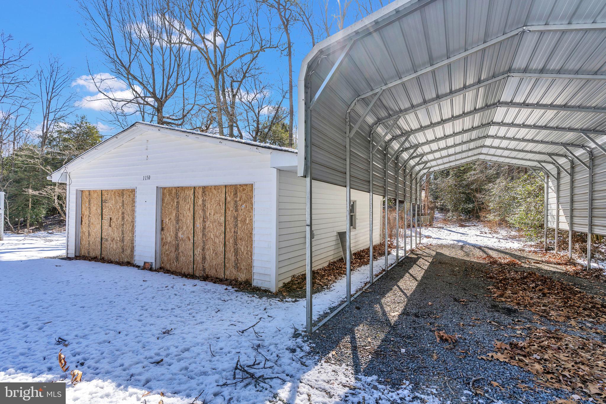 1150 Calvert Beach Road St. Leonard, MD 20685 - Photo 37 of 42 a view of a house with a yard